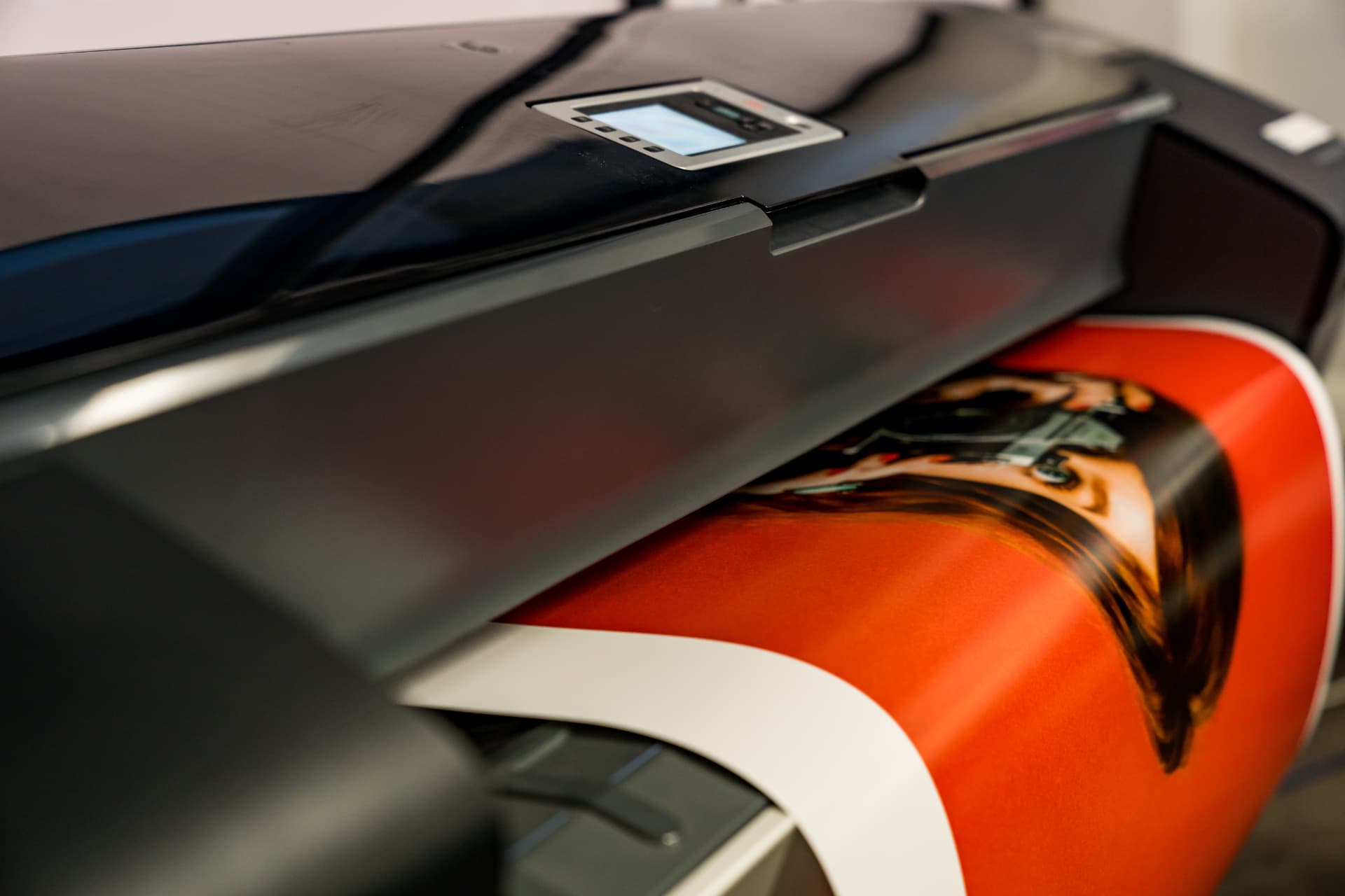 Wide format printer producing a large colour print at Rieger’s Print